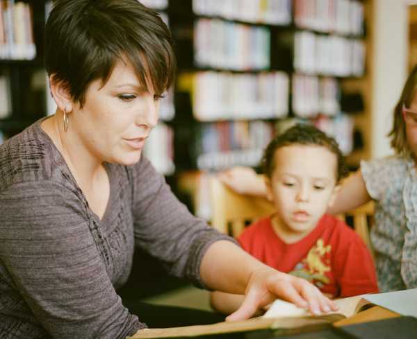 teacher reading to student